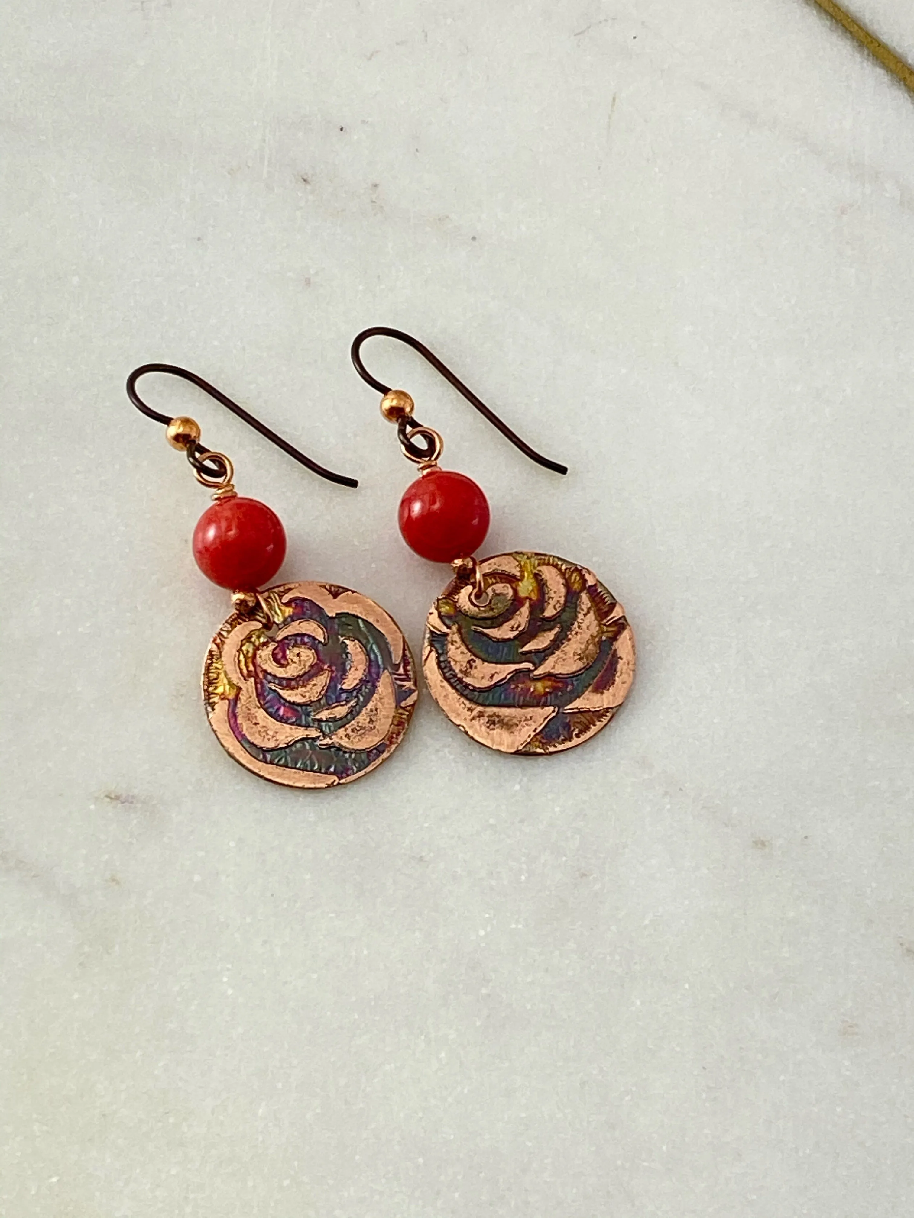 Acid etched copper earrings with coral gemstones