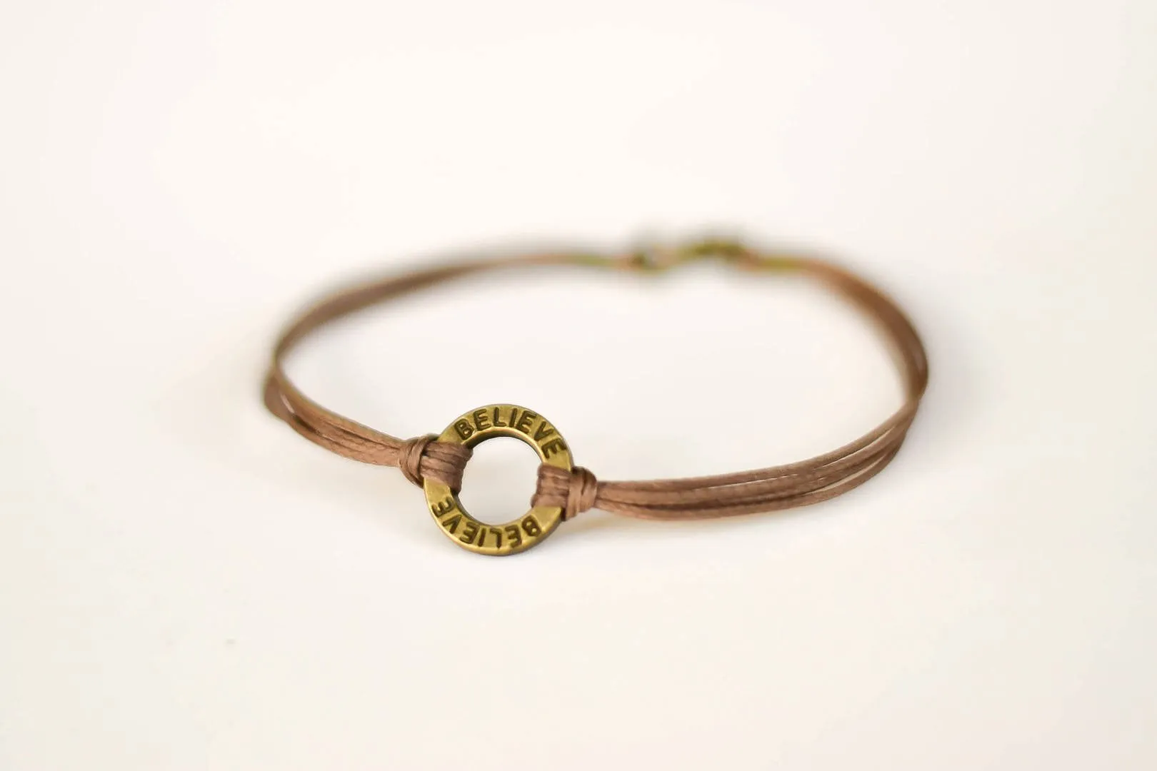 Bronze circle Believe bracelet for men, brown cord, Karma bracelet, fathers gift for him