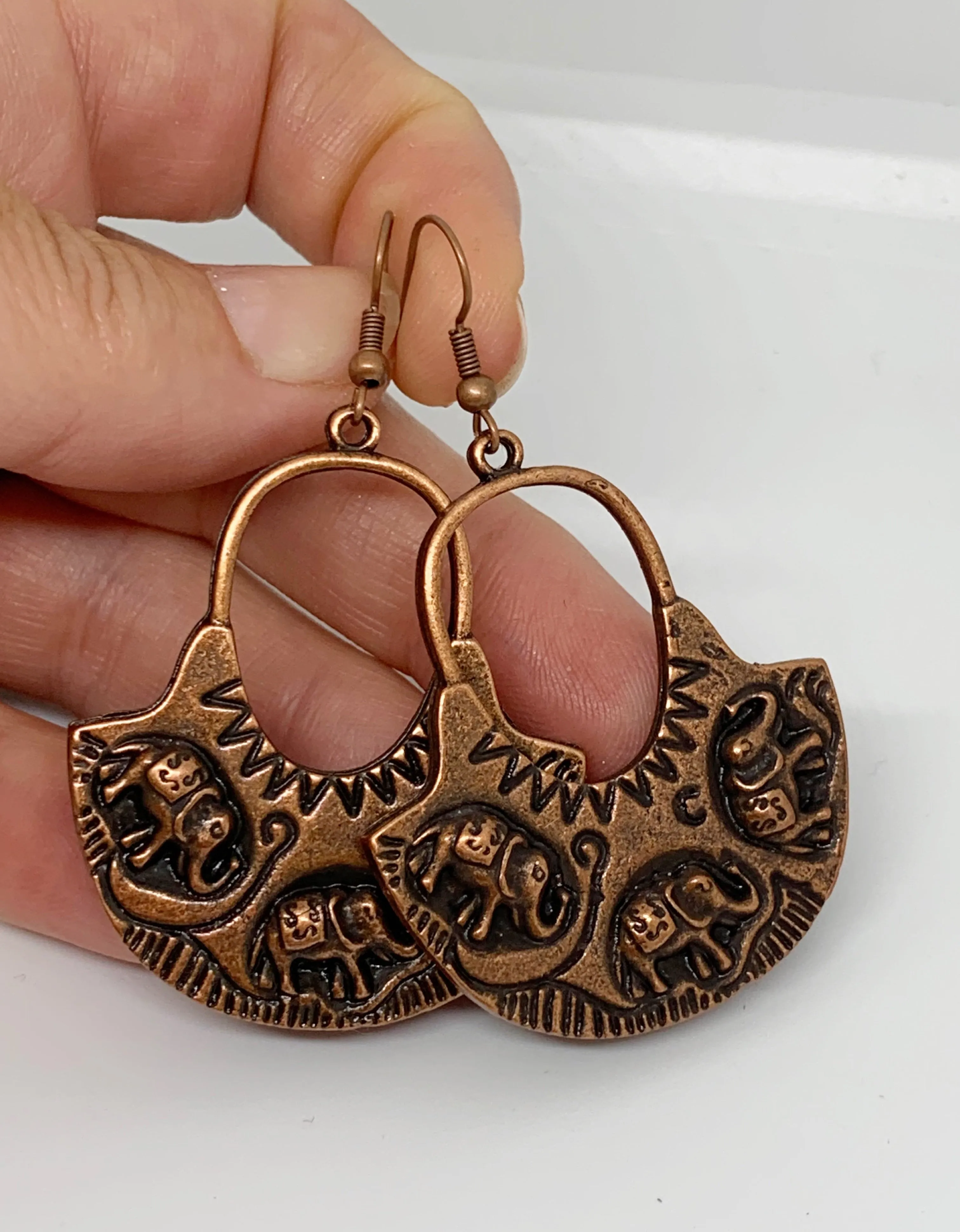 Elephant hoops, copper metal earrings