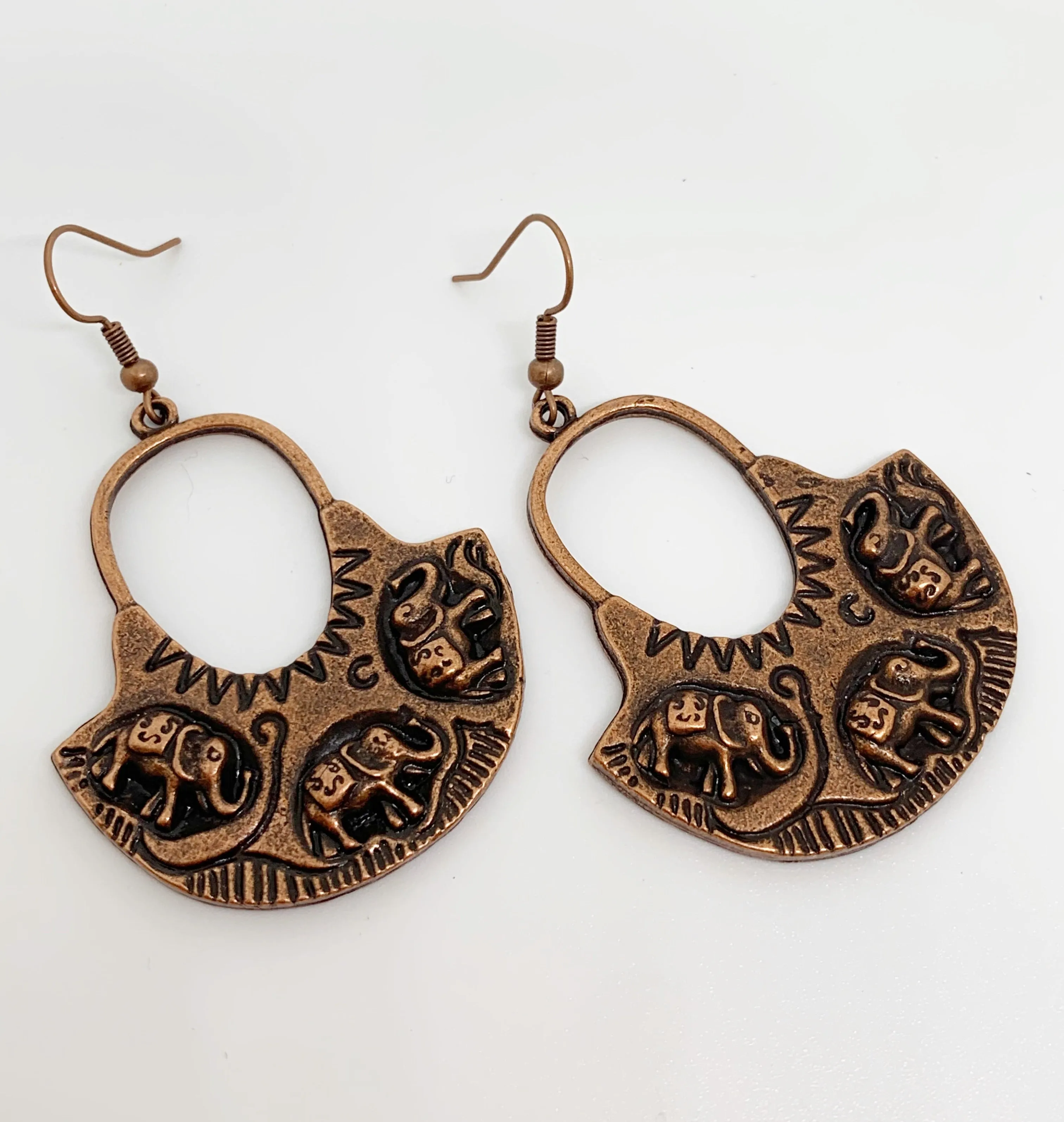 Elephant hoops, copper metal earrings