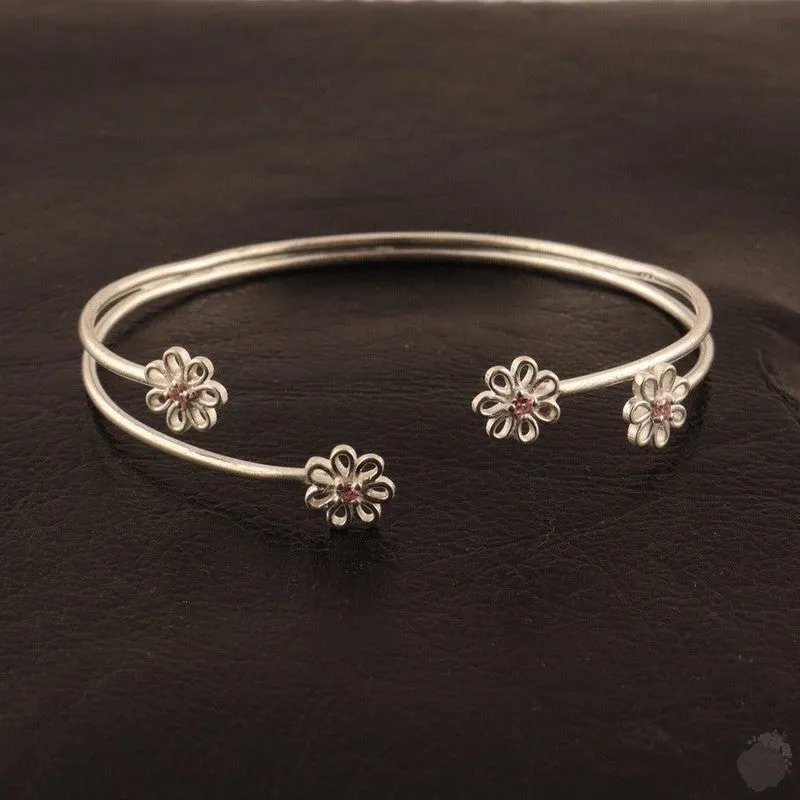 Emerald or a Blue Topaz Four Daisies Bangle - Sterling Silver