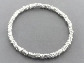 irregular disc bead stacked bangle - sterling silver