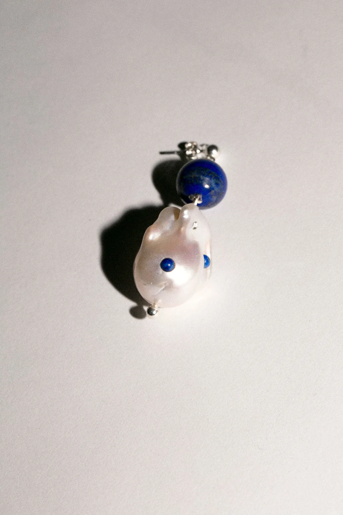 Single Lapis Globe Earing